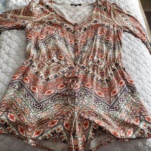 Romper with arm slits